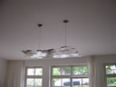 This modern design lighting fixture can be used as a room's primary source of light and it brings a unique stylish element to the space.